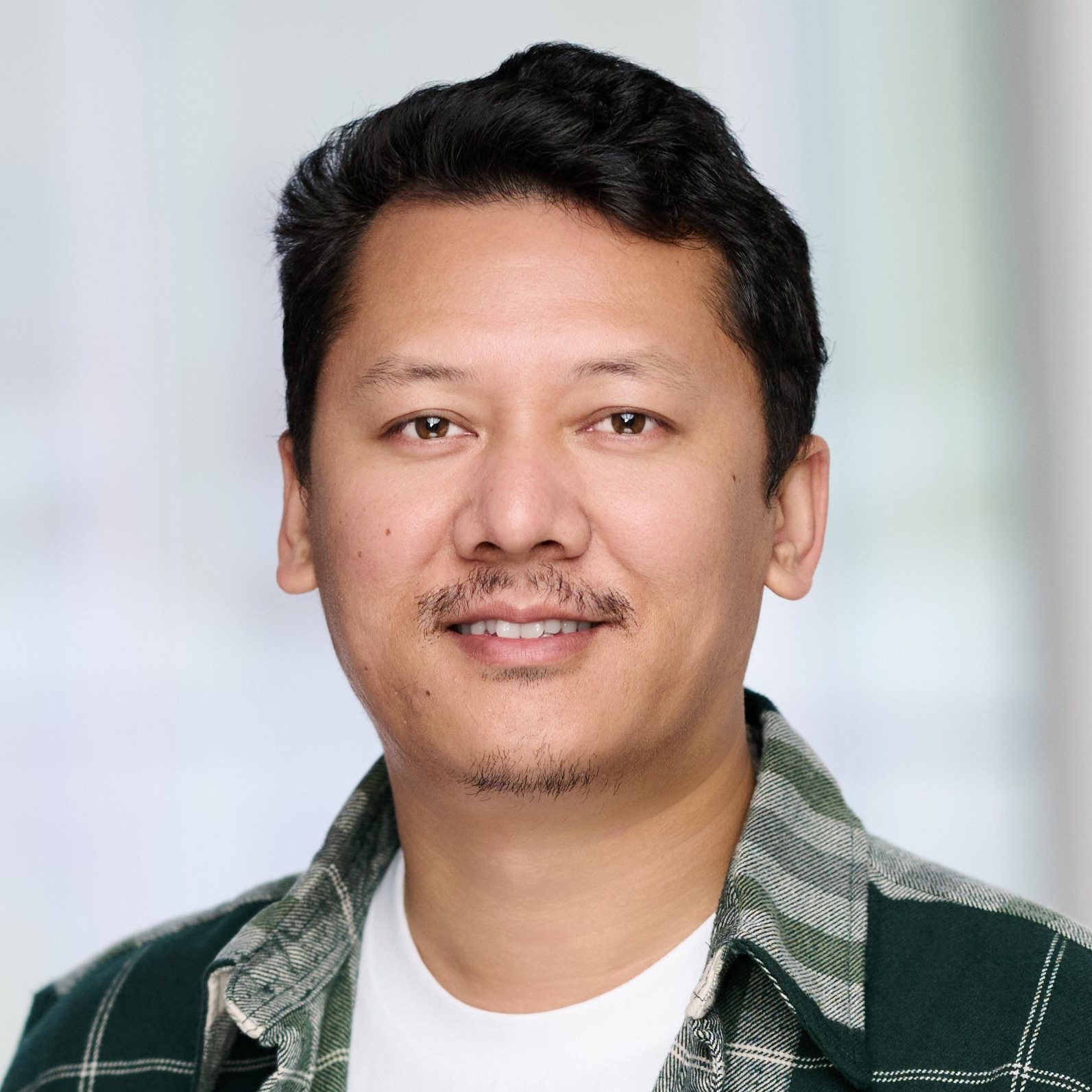 Dr. Pukar Maharjan