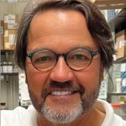 Dr. John Tisdale