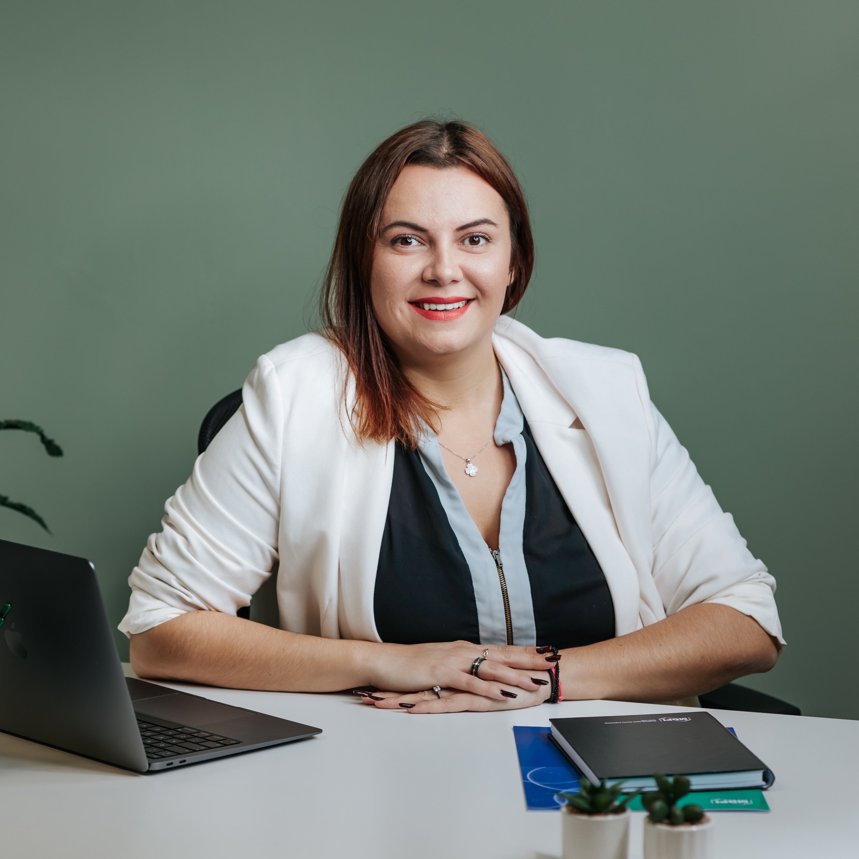 Ms. Cristina Georgiana Spelmezan
