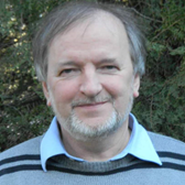 Dr. András Dér